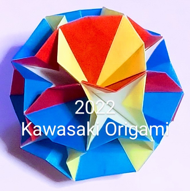 2022/08/19(Fri) 17:52「変わり組み球面アラベスク」川崎敏和
（創作者 Author：川崎敏和,　製作者 Folder：川崎敏和,　出典 Source：2022年川崎折り紙キット）
 12枚組みです。球面アラベスク（作2022年8月8日）の星型5角錐を星型4角錐に変えて組んでいたとき、パーツが簡易化できることに気づきました。変わった組み方をお楽しみ下さい。